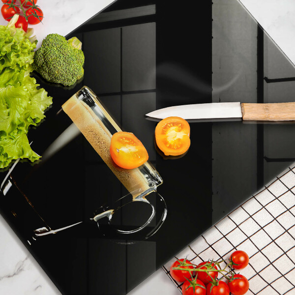 Protection plaque induction Un verre de café noir