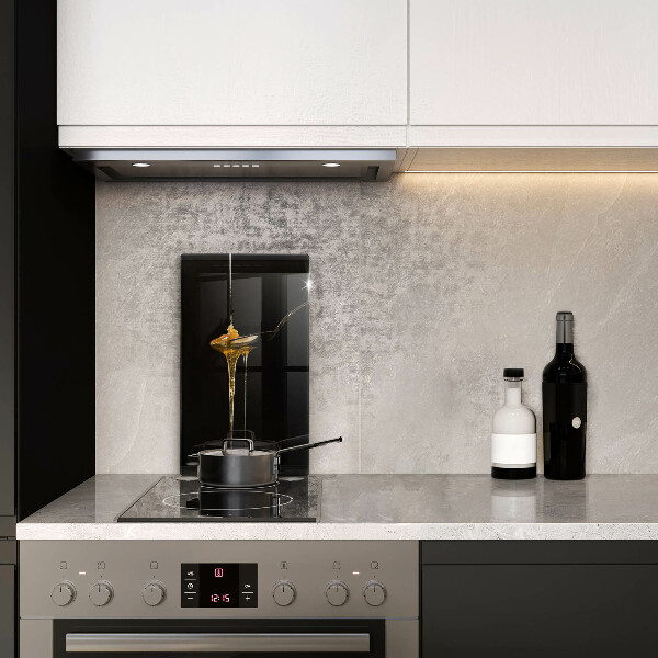 Protection plaque induction Une cuillère à café de miel