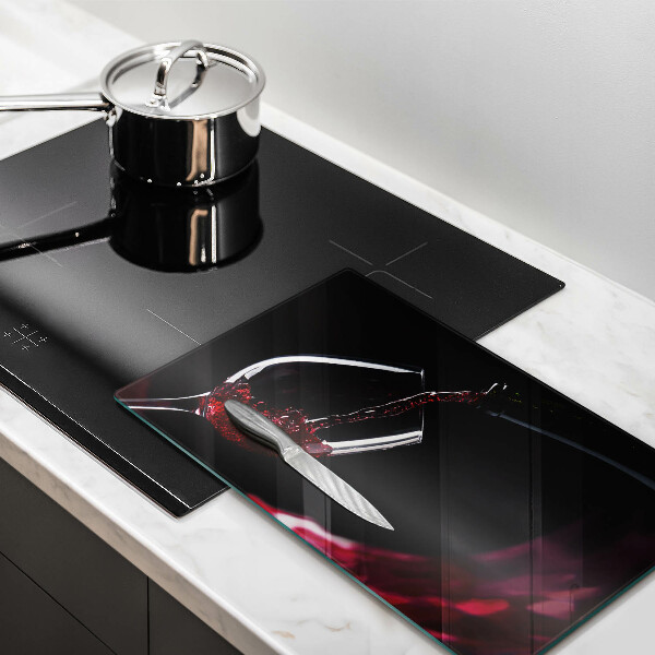 Protège plaque de cuisson Un verre de vin rouge