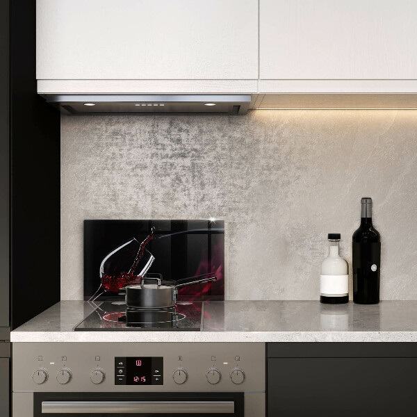 Protège plaque de cuisson Un verre de vin rouge