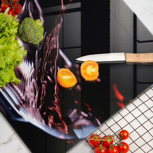 Cache plaque de cuisson Un verre de vin rouge