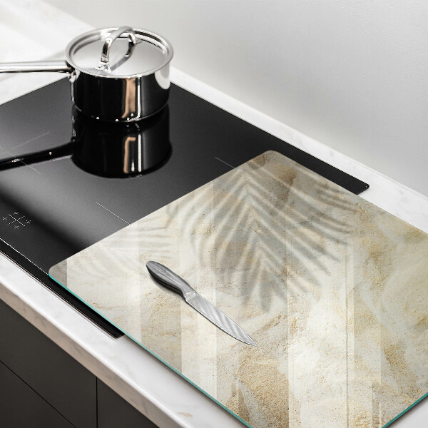 Cache plaque de cuisson Feuilles de palmier et sable