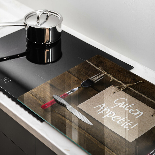 Protège plaque de cuisson Inscription Guten Appetit sur des planches de bois