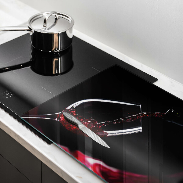 Protège plaque de cuisson Un verre de vin rouge