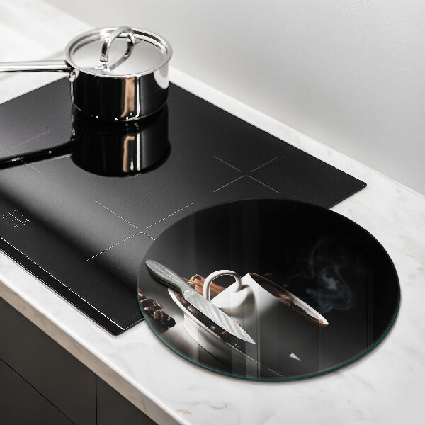 Protection plaque induction Une tasse de café chaud