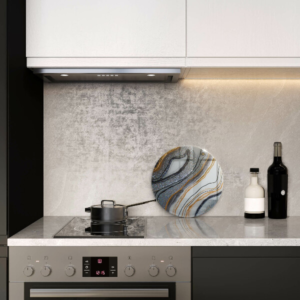 Protection plaque induction rocher avec de l'or