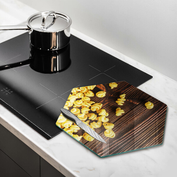 Protège plaque de cuisson Des pâtes sur la table