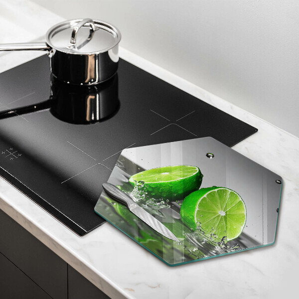 Cache plaque de cuisson Citrons verts juteux et eau