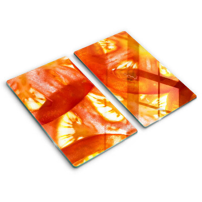 Protection plaque induction Une tranche de tomate rouge