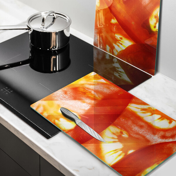 Protection plaque induction Une tranche de tomate rouge