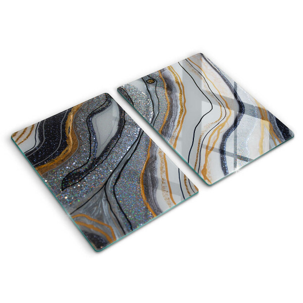 Protection plaque induction rocher avec de l'or