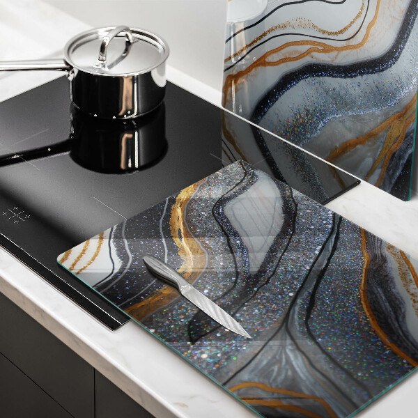 Protection plaque induction rocher avec de l'or