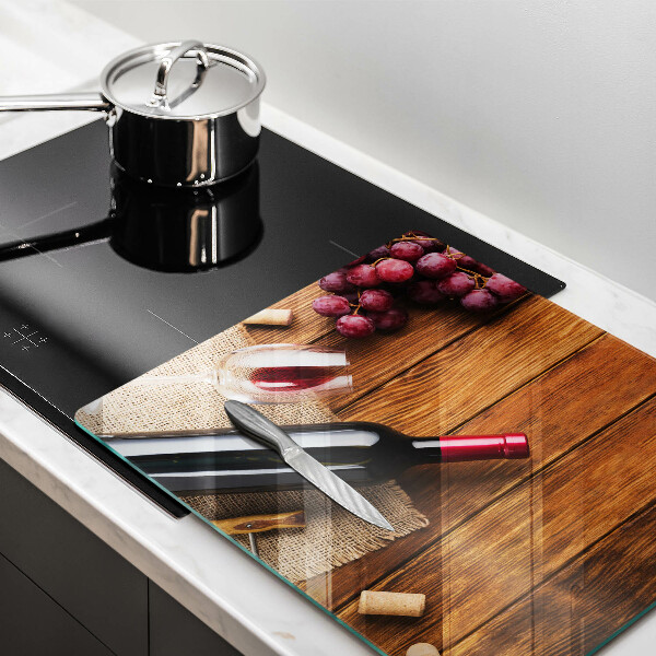 Protège plaque de cuisson Une bouteille de vin rouge