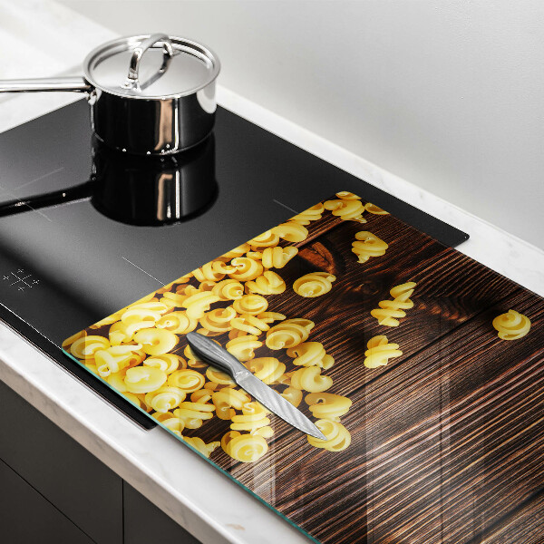 Protège plaque de cuisson Des pâtes sur la table