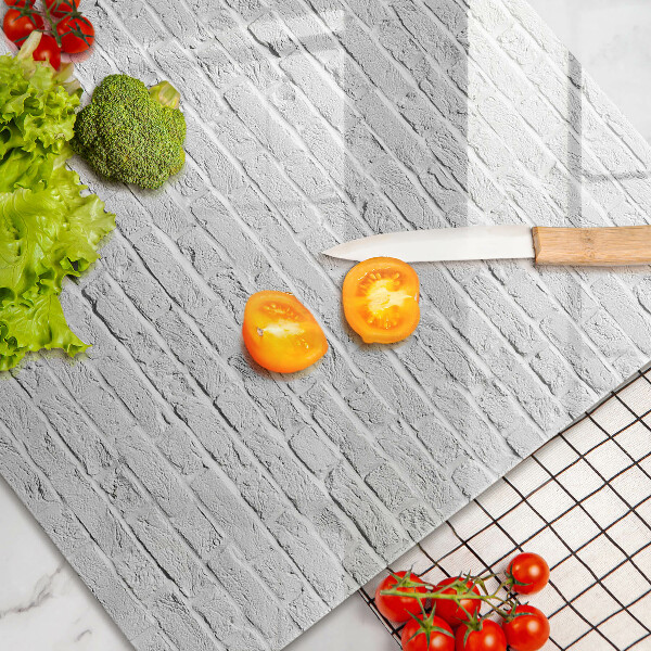 Protection plaque induction Mur de briques