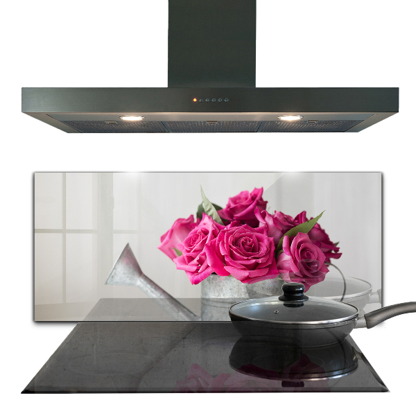 Crédence cuisine en verre Arrosoir avec un bouquet de roses