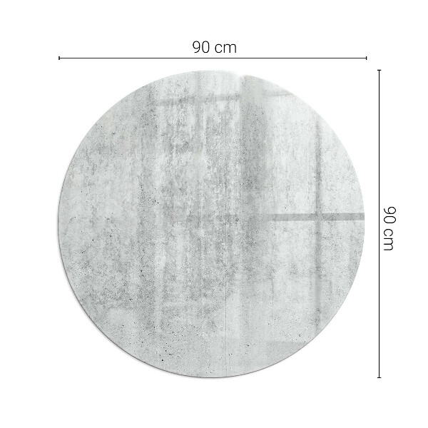 Ronde vitre sous poêle à bois texture du béton brut