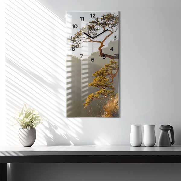 Horloge rectangulaire verticale Un arbre dans les montagnes