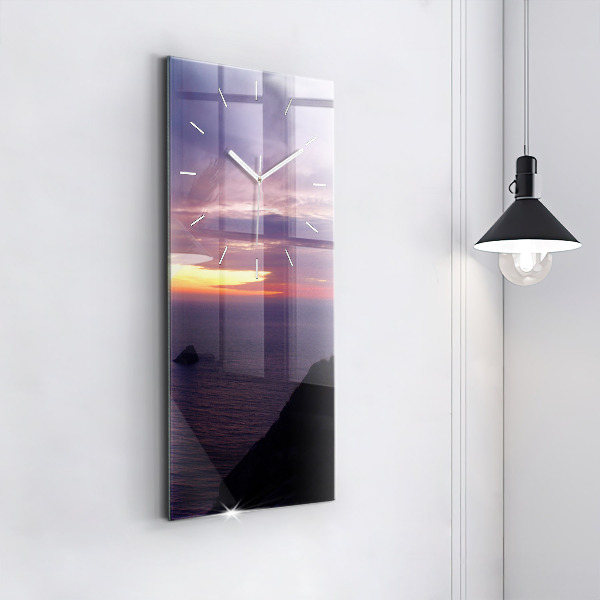 Horloge rectangulaire verticale Tête de pierre