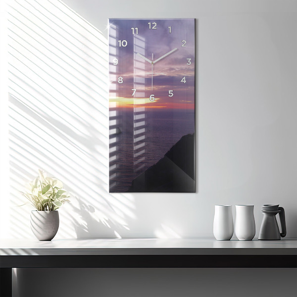 Horloge rectangulaire verticale Tête de pierre