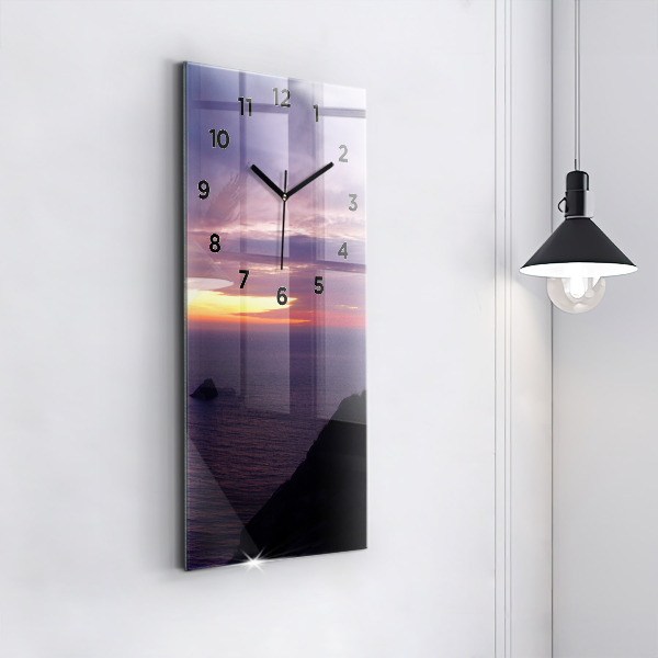 Horloge rectangulaire verticale Tête de pierre