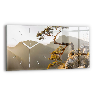 Horloge rectangulaire horizontale Un arbre dans les montagnes