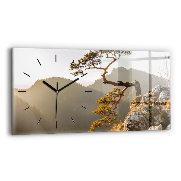 Horloge rectangulaire horizontale Un arbre dans les montagnes