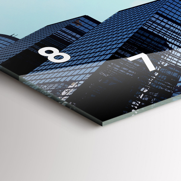 Horloge rectangulaire horizontale Avion au-dessus des bâtiments