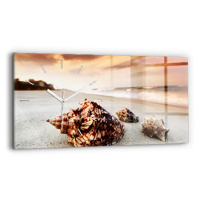 Horloge rectangulaire horizontale Un coquillage sur la plage