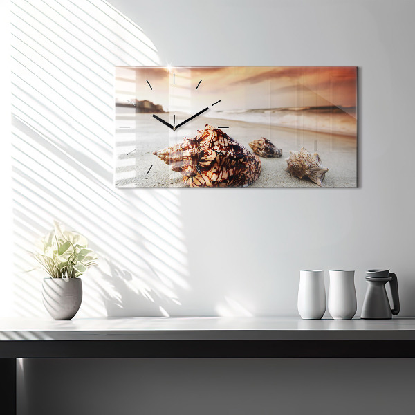 Horloge rectangulaire horizontale Un coquillage sur la plage