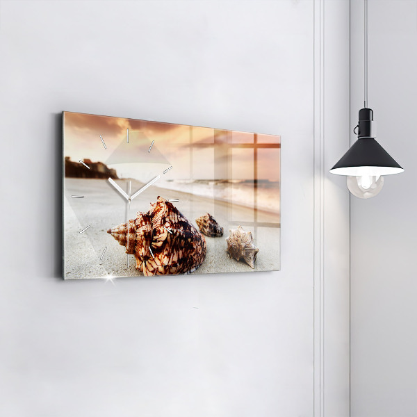 Horloge rectangulaire horizontale Un coquillage sur la plage