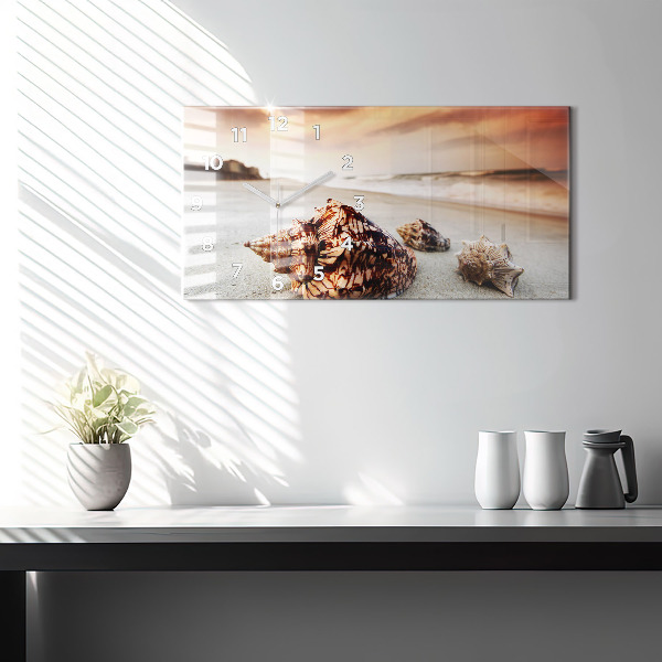 Horloge rectangulaire horizontale Un coquillage sur la plage