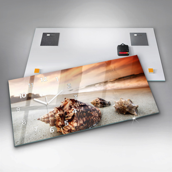 Horloge rectangulaire horizontale Un coquillage sur la plage