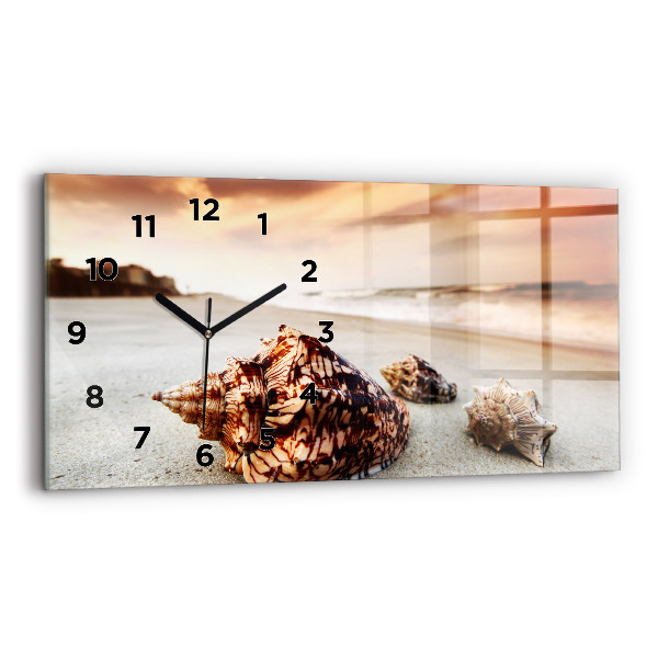 Horloge rectangulaire horizontale Un coquillage sur la plage