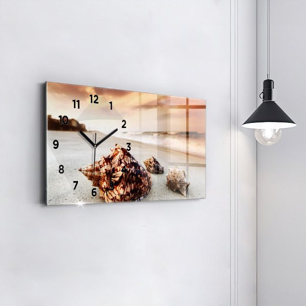 Horloge rectangulaire horizontale Un coquillage sur la plage