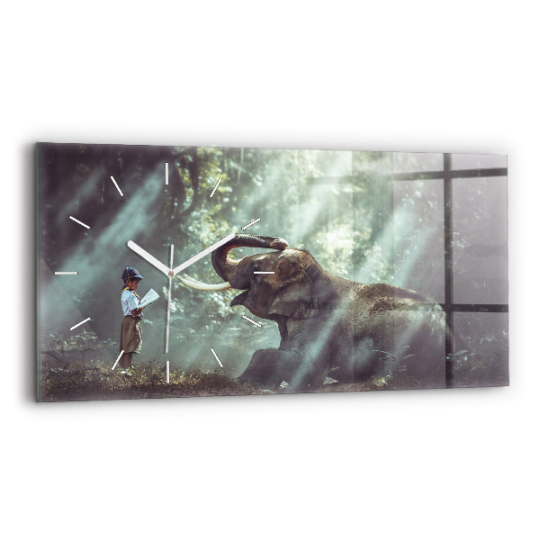 Horloge murale horizontale Un garçon lit un livre