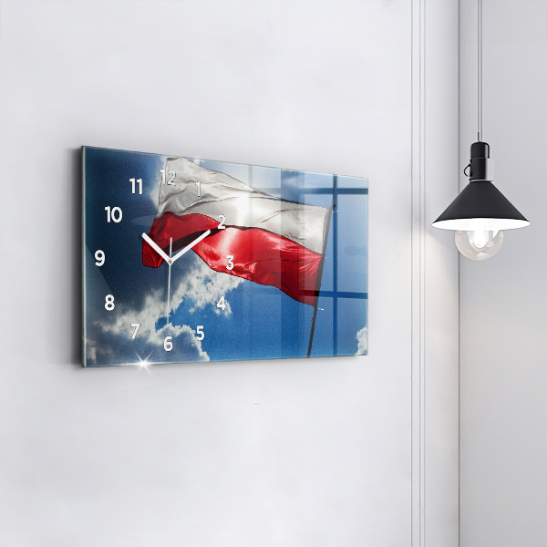Horloge murale horizontale Le drapeau polonais contre le ciel
