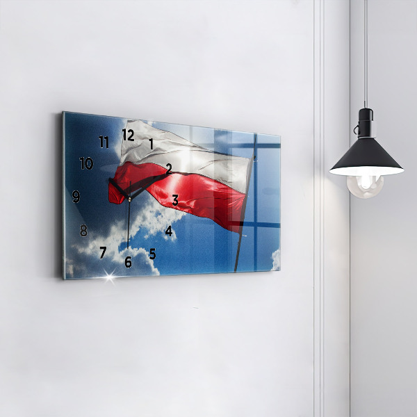 Horloge murale horizontale Le drapeau polonais contre le ciel
