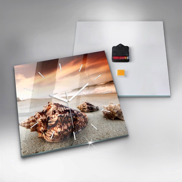Horloge murale carrée Un coquillage sur la plage