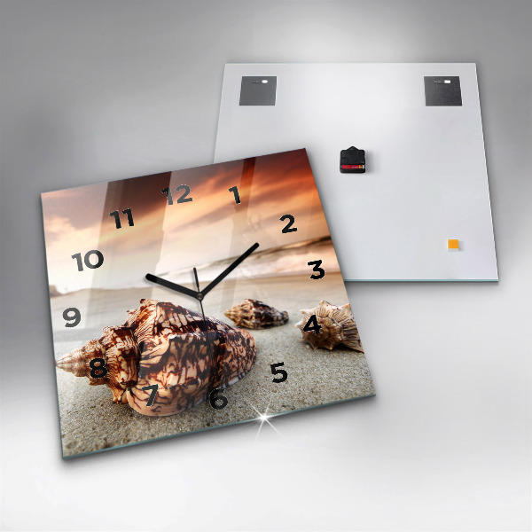 Horloge murale carrée Un coquillage sur la plage