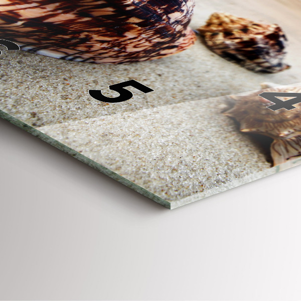 Horloge murale carrée Un coquillage sur la plage