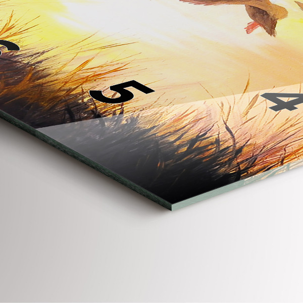 Pendule carrée en verre Grues au coucher du soleil