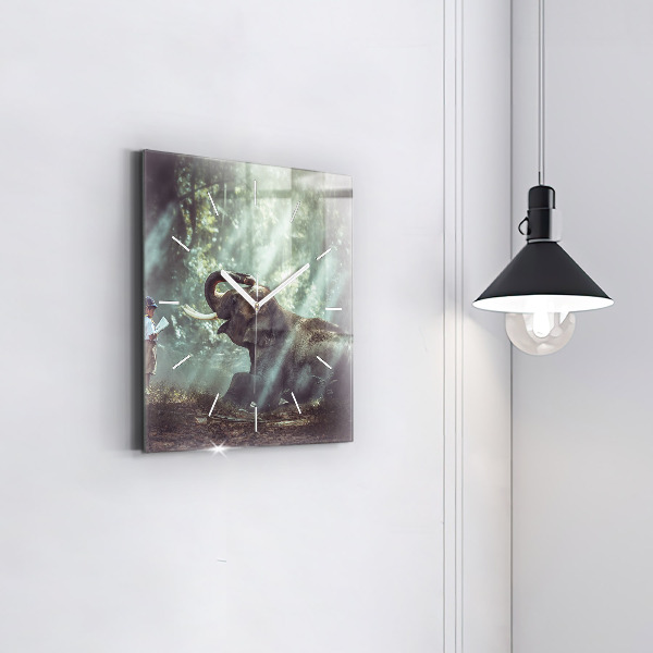 Horloge murale carrée Un garçon lit un livre