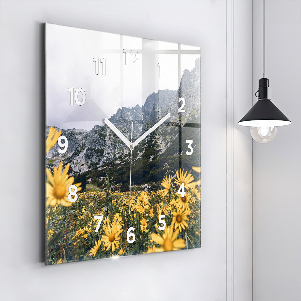 Horloge murale carrée Fleurs des prés dans les montagnes