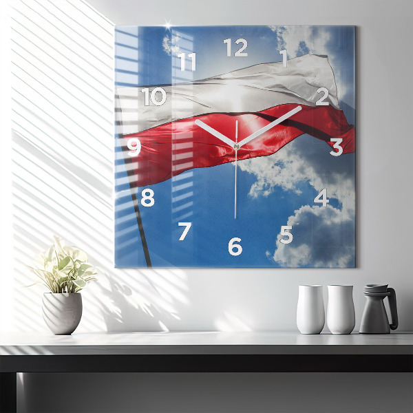 Horloge murale carrée Le drapeau polonais contre le ciel