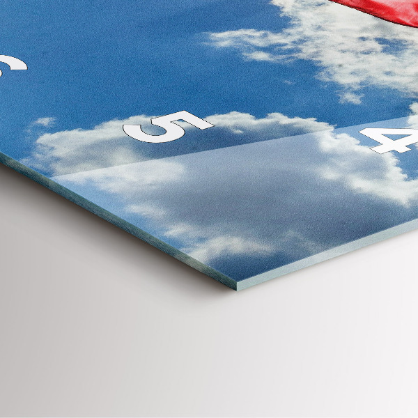 Horloge murale carrée Le drapeau polonais contre le ciel