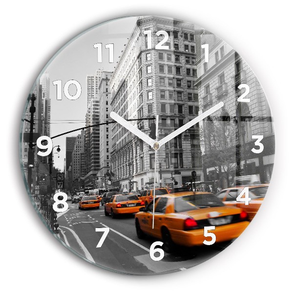Horloge ronde Manhattan et les taxis