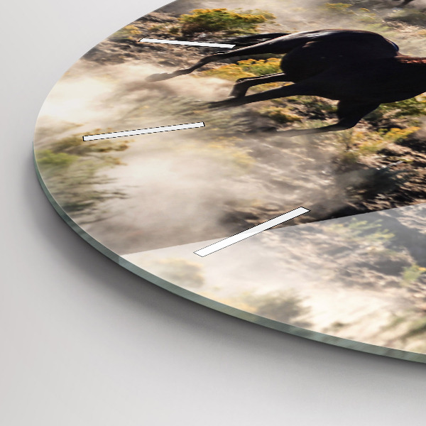Horloge ronde Un troupeau de chevaux au galop
