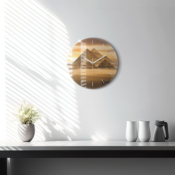 Horloge ronde Pyramides et coucher de soleil