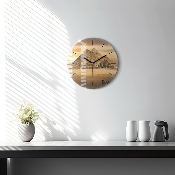 Horloge ronde Pyramides et coucher de soleil